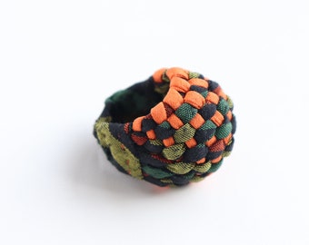 Woven ring made of recycled Kimono silk, textile jewelry