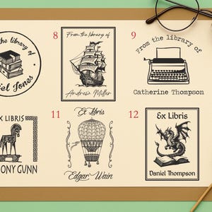 May include: A collection of six black and white book stamps with various designs. The stamps include a stack of books, a sailboat, a typewriter, a horse, a hot air balloon, and a dragon. Each stamp includes a name.