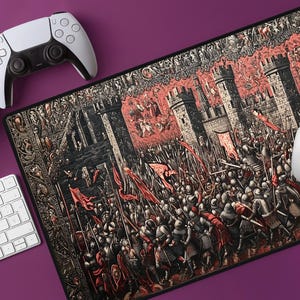 May include: A black and red mouse mat featuring a medieval battle scene with a castle, soldiers, and flags. The scene is depicted in a detailed, woodcut-style illustration.
