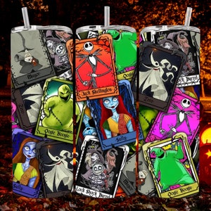 May include: A stainless steel tumbler with a colourful design featuring characters from The Nightmare Before Christmas. The design includes Jack Skellington, Sally, Oogie Boogie, and Zero. The tumbler is surrounded by pumpkins and autumn foliage.