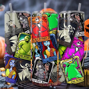 May include: A stainless steel tumbler with a colourful design featuring characters from The Nightmare Before Christmas. The design includes Jack Skellington, Sally, Oogie Boogie, Zero, and Lock, Shock, and Barrel. The tumbler is perfect for Halloween.