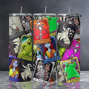 May include: A colorful tumbler with a collage of characters from the Nightmare Before Christmas. The characters are arranged in a card-like format with their names printed below each image. The characters include Jack Skellington, Sally, Oogie Boogie, Zero, and Mayor.