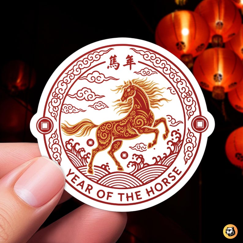 Close-up of a circular vinyl sticker featuring a red and gold ornate horse in a rearing pose, symbolizing the Chinese zodiac Year of the Horse. The design includes traditional clouds and waves, with the text "YEAR OF THE HORSE" and Chinese characters. Perfect for Lunar New Year 2026.