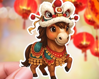 May include: A sticker of a cartoon horse wearing a traditional Chinese lion dance costume. The horse is brown with a white and red headdress, and a teal and red saddle. Red lanterns are in the background.
