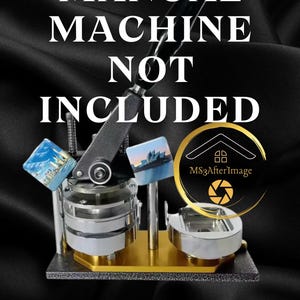 May include: A button-making machine with a black handle and gold base. The text "MANUAL MACHINE NOT INCLUDED" is at the top. The words "Raw Materials only" are at the bottom. Two finished buttons are visible.