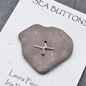 Big red  a rustic red stone heart... a  naturally ocean shaped  Maine sea stone button  one of a kind statement for knitting and jewelry
