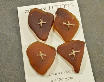 Four sweet triangular amber brown drilled Maine sea/ beach  glass buttons for sweaters or scarves