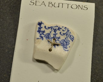 Unique off white and blue drilled sea pottery button from the coast of Maine for sweaters craft jewelry