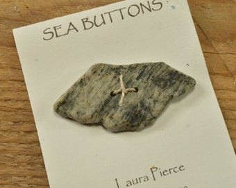 Shark   a grey and black streaked  Maine sea stone button