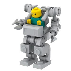 Könnte beinhalten: Eine Roboterfigur aus grauen Kunststoff-Bausteinen mit einem gelben Minifigurenkopf mit lächelndem Gesicht und einem türkisfarbenen Oberkörper im Cockpit. Der mechanische Anzug hat bewegliche Arme mit Greifhänden und stabile Beine.