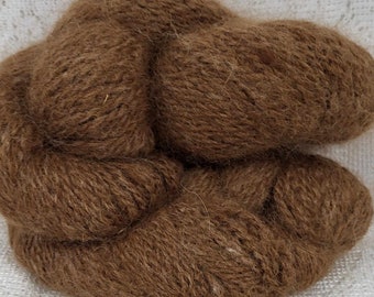 Natural light brown color alpaca yarn.  Tennessee Alpacas. Baby alpaca yarn. Hand spun alpaca. Tweed alpaca. Happy.