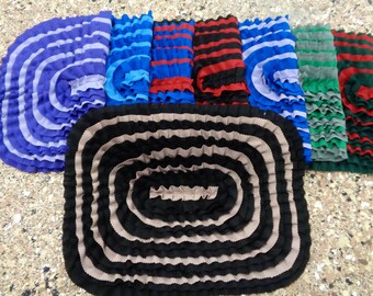 Amish hand made rugs.Hand sewing rugs. Amish area rugs. Multi colored rugs.8 colors available now. Red, blue, green, black , purple , blue .