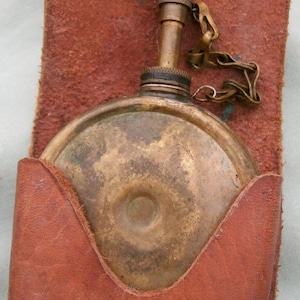 Old Russian military brass  oiler in a leather case. Very rare.