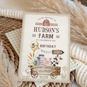 May include: A rustic-themed invitation for Hudson's 5th birthday. The design features a farm scene with a barn, a wagon carrying a pig and cow, and the text "HUDSON'S FARM". The invitation includes the date, time, and location.