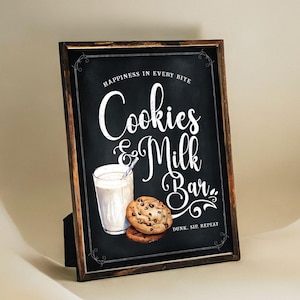 May include: A rustic wooden sign with a chalkboard background. The sign reads "Happiness in every bite Cookies & Milk Bar. Dunk. Sip. Repeat."  The sign features a glass of milk and a chocolate chip cookie.