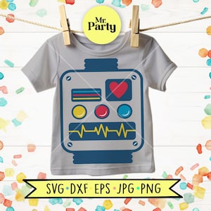 May include: A light grey short-sleeved t-shirt featuring a dark blue robot graphic on the front. The robot design includes a red heart, three colourful circular buttons, and a yellow EKG line. The shirt is displayed hanging from a wooden clothespin.