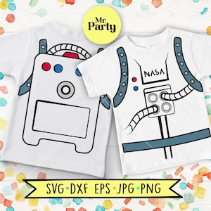 May include: Two white t-shirts featuring astronaut suit graphics. One shirt displays a NASA logo, blue straps, and a life support chest pack with hoses. The other shirt shows a back view of the suit with a rectangular pack, buttons, and straps.