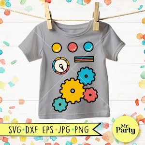 May include: A grey t-shirt featuring a colourful graphic of gears and circular shapes. The design includes yellow, red, and blue elements, with the text "SVG DXF EPS JPG PNG" in a banner at the bottom. The shirt is hanging on a clothesline.