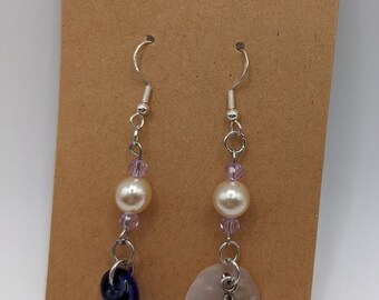 Mismatched Mermaid tail earrings featuring hand blown glass