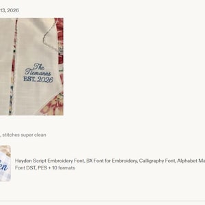 May include: A white fabric item featuring blue machine embroidery. The left side displays a large letter T monogram, while the right side shows the text The Tiemanns EST. 2026. A separate smaller image shows the blue embroidered name Hayden on blue gingham.