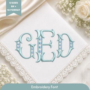 May include: White handkerchief with a delicate lace trim and embroidered letters G, E, and D in a light blue color. The text "6 Sizes 8X + 10 Format" is in the upper left corner, and "Embroidery Font" is at the bottom.