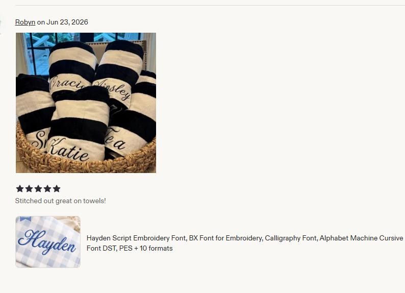 May include: A collection of folded towels featuring thick black and white horizontal stripes. Each towel is personalized with embroidered names in a cursive script font, including the names Gracie, Ainsley, Katie, and Lea, all arranged in a basket.