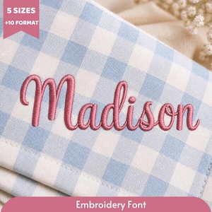 May include: A light blue and white gingham fabric featuring the name Madison embroidered in a cursive pink thread. A pink banner in the top left corner displays the text 5 SIZES +10 FORMAT, and a pink banner at the bottom displays Embroidery Font.