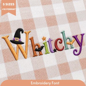 May include: An embroidery design featuring the word Witchy in multi-colored letters on a light pink and white gingham fabric. The letter W is topped with a black witch hat, while small black bats, a star, and a moon accent the lettering.