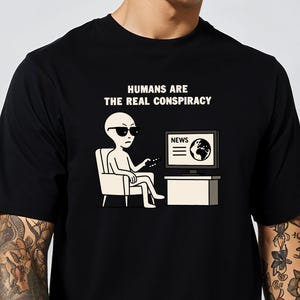 Funny Alien Watching TV Tee, UFO Believer TShirt, Extraterrestrial Humor Gift, Humans Are The Real Conspiracy Shirt, Conspiracy Theory Shirt