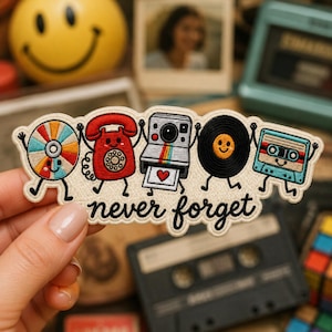May include: An embroidered patch featuring five anthropomorphic retro items: a colorful CD, a red rotary phone, an instant camera with a heart photo, a black vinyl record, and a blue cassette tape, with the text never forget in black script.