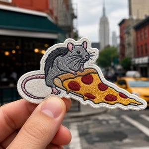 May include: An embroidered patch featuring a grey rat with pink ears and a long tail, standing on a triangular slice of pepperoni pizza with a golden yellow crust, melted cheese, and dark red circular pepperoni toppings on a white border.