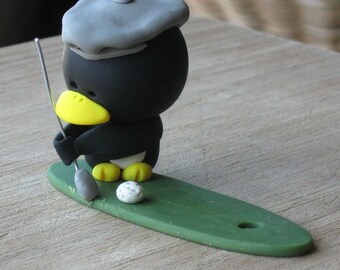 golfer penguin