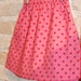 Reviewed by Anonymous reviewed Pink and Red Polkadots A-line Skirt - modern toddler girls clothing - fall fashion - size 4 - ready to ship