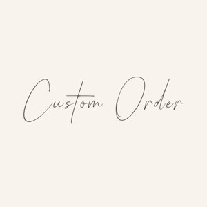 May include: A light beige background with the words "Custom Order" written in a delicate, cursive font. The text is a soft gray color, creating a subtle contrast against the background.