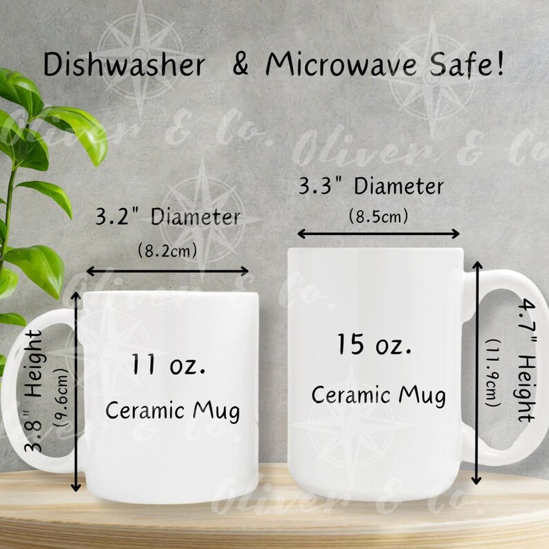 May include: Two white ceramic mugs with dimensions displayed. The smaller mug is 3.2 inches (8.2cm) in diameter and 3.8 inches (9.6cm) high, holding 11 oz. The larger mug is 3.3 inches (8.5cm) in diameter and 4.7 inches (11.9cm) high, holding 15 oz. Text indicates they are dishwasher and microwave safe.