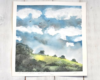 May include: Watercolor painting of a landscape with a cloudy sky and a green hill. The sky is blue with white clouds and three birds. The hill has green trees and small white flowers. The text "Summer Storm" is at the bottom.