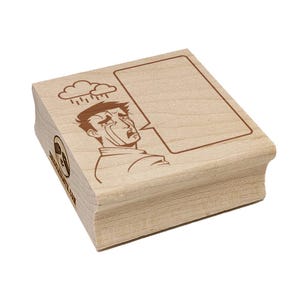 May include: Wooden stamp featuring a crying man under a rain cloud, with a blank speech bubble. The stamp has the text "www.elzup.com" on the side. Ideal for crafting and adding a comic touch to projects.