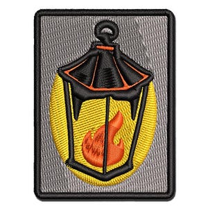 May include: A rectangular embroidered patch featuring a black lantern with orange accents and a bright yellow glow. Inside the lantern, a vibrant orange flame is depicted. The entire design is set against a light gray background with a black border.