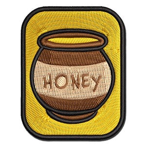 May include: A yellow embroidered patch with a brown honey pot with the word "HONEY" on it.