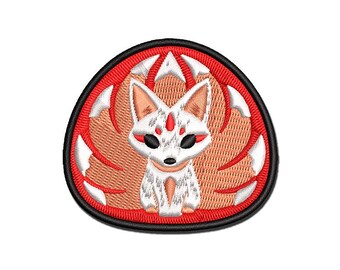 May include: Embroidered patch featuring a white fox with red markings, surrounded by a red and white swirl design. The fox has a cute, cartoon-like appearance.
