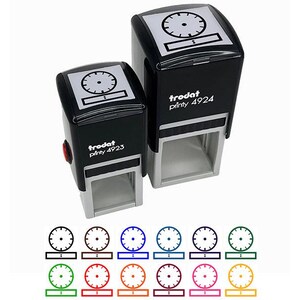 May include: Two black Trodat Printy 4923 and 4924 self-inking stamps with a clock face design. The stamps have a rectangular imprint area and a black body. Below are color variations of the clock face design.