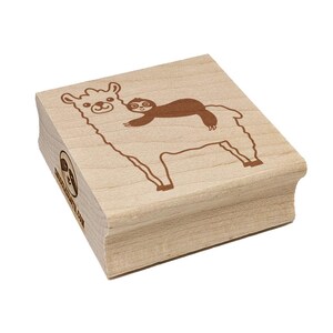 May include: A wooden stamp featuring a llama with a sloth riding on its back, both in brown ink. The stamp has rounded edges and the text "www.etsy.com" is visible on the side. The design is simple and cartoon-like.
