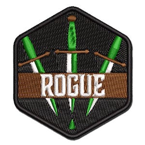 May include: Embroidered patch with a black hexagonal border. The design features three green and white swords with brown hilts, and the word "ROGUE" in white letters on a brown banner.