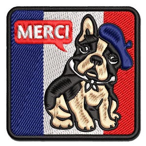May include: A square embroidered patch featuring a French bulldog wearing a blue beret. The background is the French flag with vertical blue, white, and red stripes. A red speech bubble in the upper left corner contains the white text MERCI.