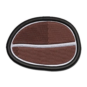 May include: An oval-shaped embroidered patch depicting a coffee bean. The patch features a dark brown center with a textured fabric appearance, divided by a horizontal white stitched line, and finished with a thick black embroidered border.