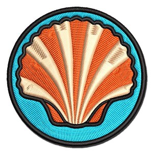 May include: A circular embroidered patch featuring a central scallop shell design with cream-colored ridges and orange textured sections. The shell is set against a bright turquoise background, all enclosed within a thick, solid black stitched border.