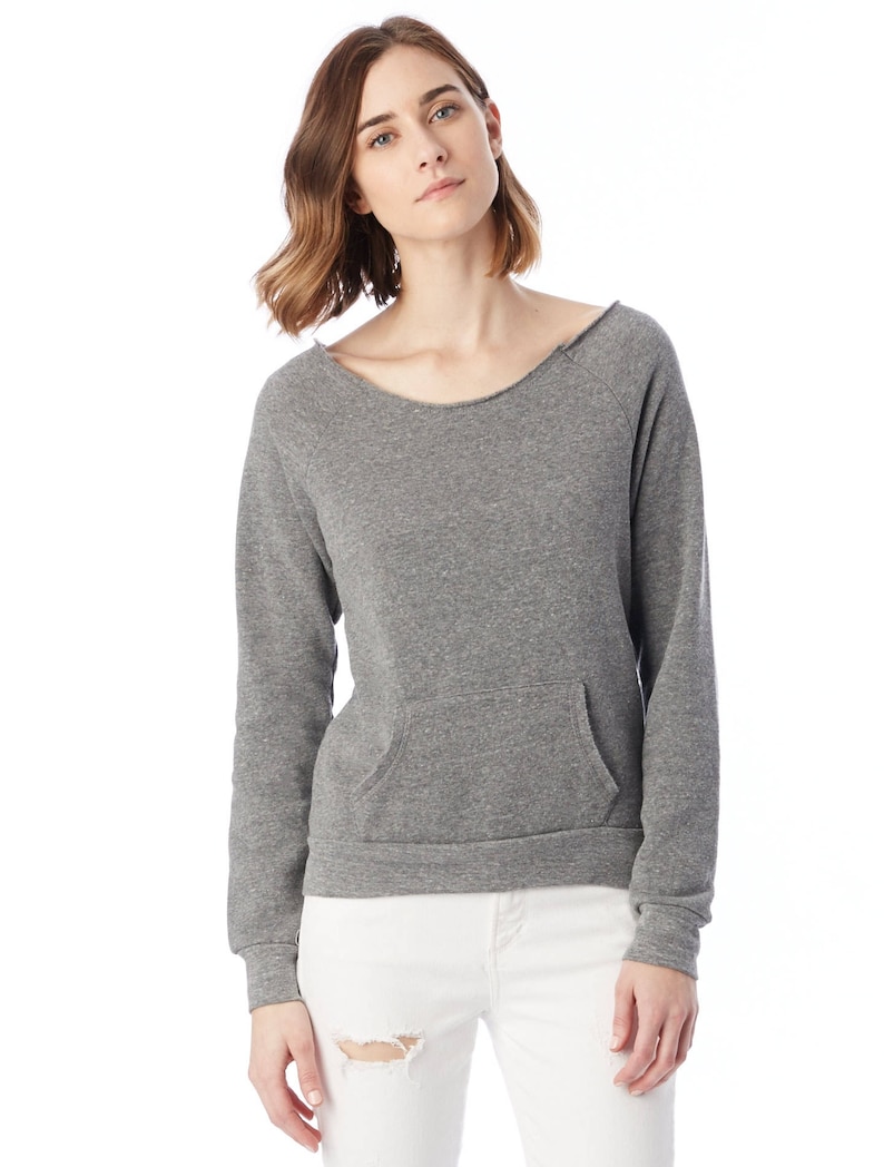 May include: A gray sweatshirt with a relaxed fit and a single front pocket. The sweatshirt has a slightly dropped shoulder and a raw edge neckline.