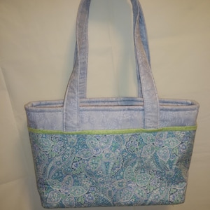 Bolso con asa superior