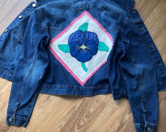 Jean jacket with vintage pansy applique quilt patch on back - L