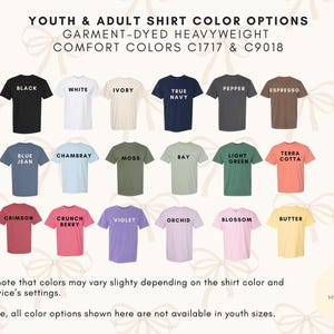 May include: A color chart displaying seventeen short-sleeve t-shirts in various shades labeled Black, White, Ivory, True Navy, Pepper, Espresso, Blue Jean, Chambray, Moss, Bay, Light Green, Terra Cotta, Crimson, Crunch Berry, Violet, Orchid, Blossom, and Butter.